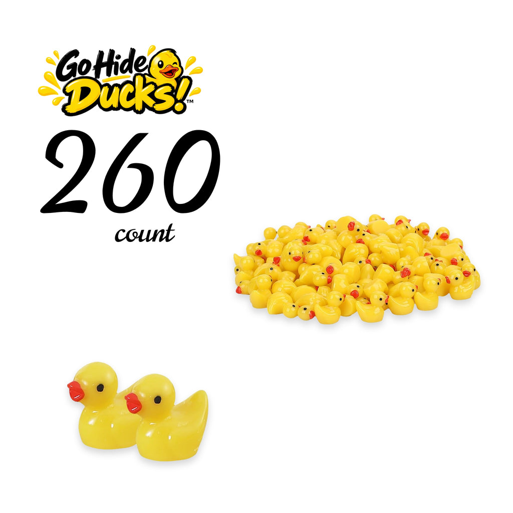 Pile of tiny yellow resin ducks with a close-up of two ducks
